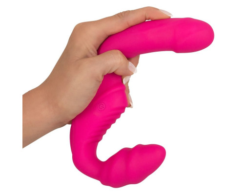 Розовый безремневой страпон с вибрацией