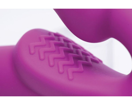 Ярко-розовый безремневой вибрострапон Evoke Vibrating Strapless Silicone Strap-on Dildo