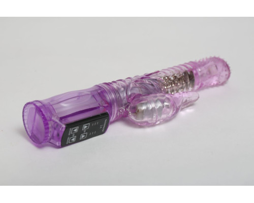 Фиолетовый силиконовый вибратор с подвижной головкой в пупырышках - 21 см.