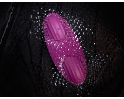 Фиолетовый клиторальный стимулятор Edeny с управлением через приложение