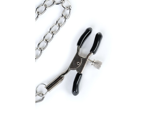 Черный кляп-трензель Theatre в виде косточки с зажимами для сосков