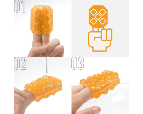 Оранжевый мастурбатор-стимулятор Tenga Uni Topaz