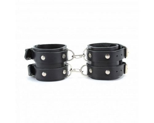 Черные кожаные оковы с двумя пряжками