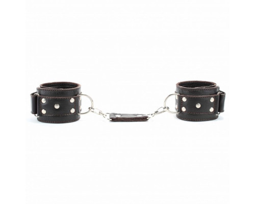 Коричневые кожаные оковы с клепками