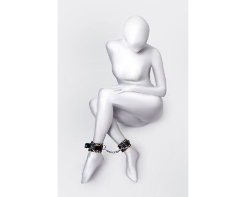 Оковы Anonymo с анималистическим принтом