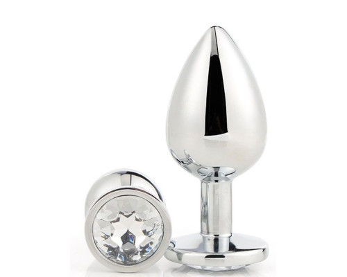 Серебристая анальная втулка с прозрачным кристаллом - 7,1 см.