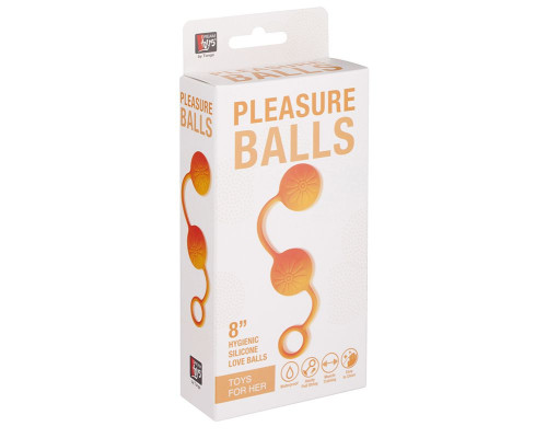 Оранжевые вагинальные шарики с цветочками на поверхности